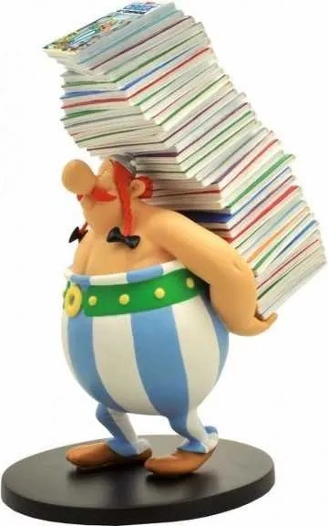 ASTERIX EN OBELIX - BEELDJE OBELIX MET EEN STAPEL ASTERIX-ALBUMS